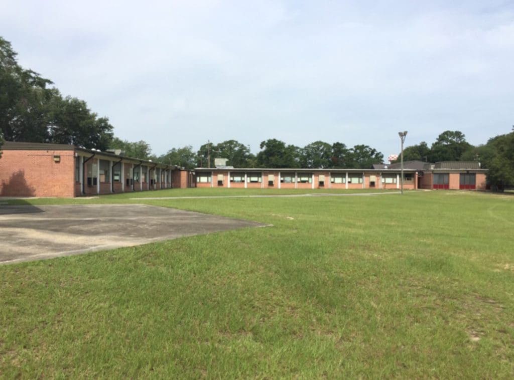 Open grounds and low buildings on a military installation