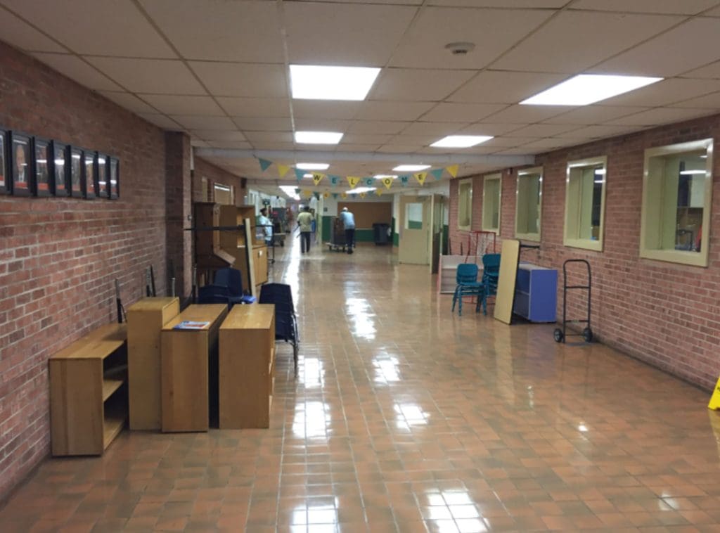 Interior hallway of a building before demolition