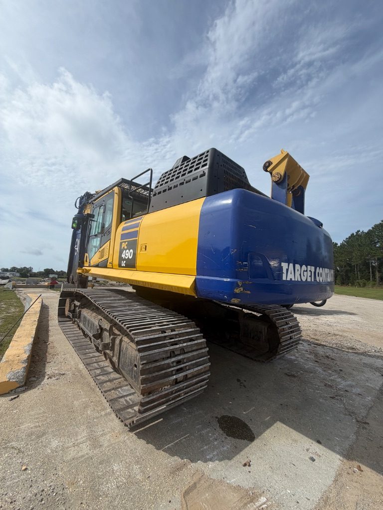 Excavator working at a demolition site