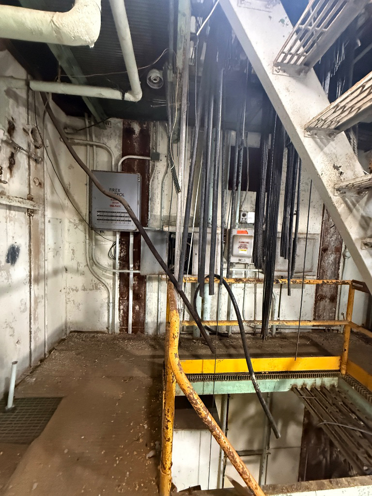 Cable runs and electrical equipment inside an industrial structure